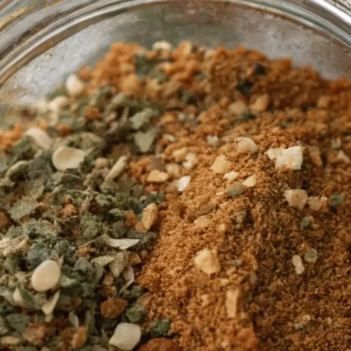 A close-up photo of the dry beefy onion soup mix in a jar