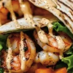 Grilled Shrimp Caesar Wrap with grill marks visible on the tortilla and shrimp.