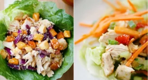 Close-up of a single Asian Chicken Salad Lettuce Wrap filled with shredded chicken, diced orange pieces, red cabbage, and sesame seeds, nestled in a vibrant green lettuce leaf.