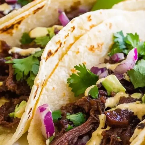 Close-up of assembled Korean Beef Tacos.
