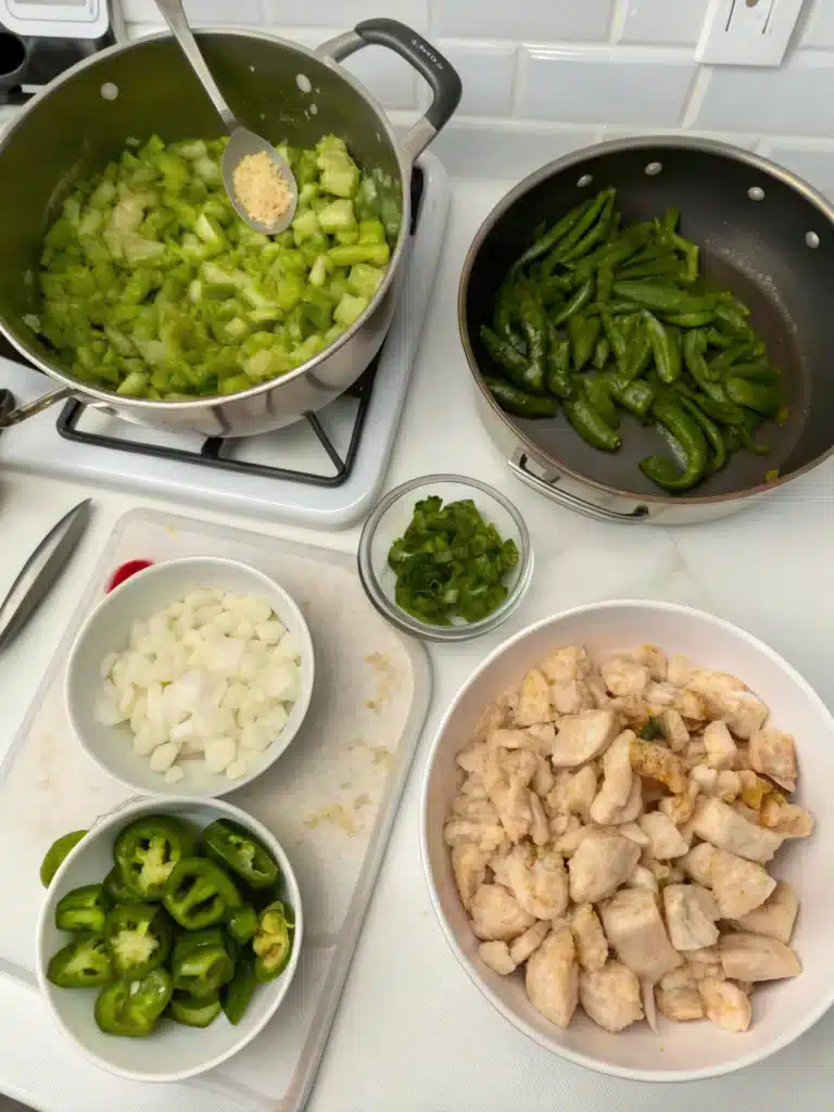 Hatch Chicken Chile Verde: A Bold and Flavorful Southwestern Favorite 7 Hatch Chicken Chile Verde simmering in a pot