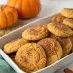 Brown Butter Pumpkin Snickerdoodle Cookies on a plate with fall décor